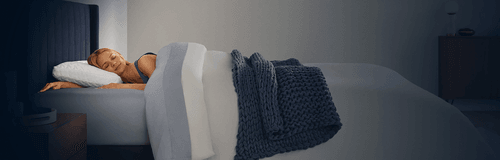 Woman sleeping on a Cloud Standard Pillow